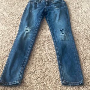 Skinny dark wash distressed jeans size 4